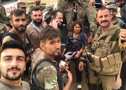 المقاتلة السورية وسط عناصر من فصائل تركيا