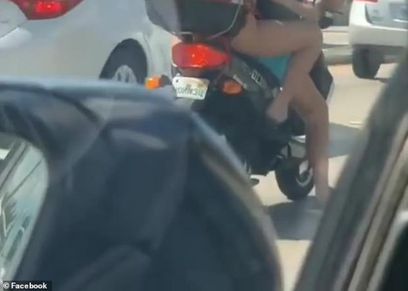 بالفيديو| سيدة تحلق شعر ساقيها في أحد الطرق المزدحمة