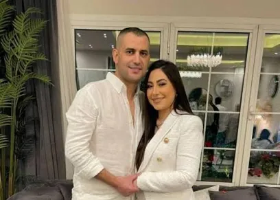 المطربة بوسي مع زوجها هشام ربيع