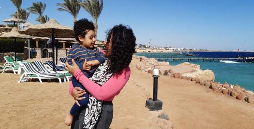 أميرة رضا تشارك في منتدى شباب العالم بصحبة ابنها الاصغر