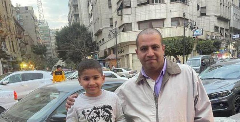 الدكتور السمان مع ابنه
