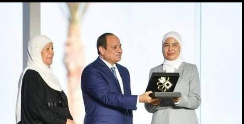 تكريم الرئيس للدكتورة رنا حامد