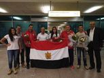 بالصور: استقبال بطلة الرماية عفاف الهدهد بالورود وعلم مصر في المطار