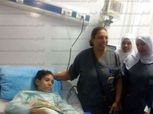 مجدي عبد الغني يلتقط صورا مع أطفال مستشفى أبو الريش