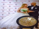 فوتو سيشن لمشجع زملكاوي وزوجته الجزائرية بصحبة درع الدوري بالزمالك
