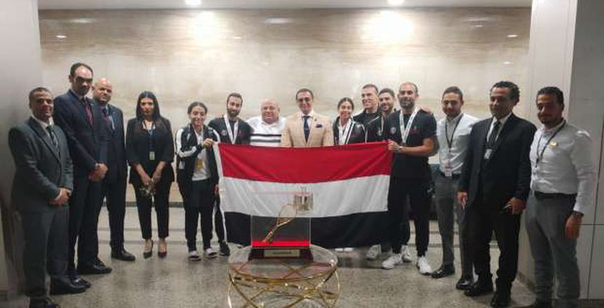 استقبال رسمي لبعثة منتخب الإسكواش في المطار بعد الفوز بكأس العالم