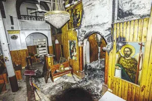 «كنائس ملوى» بعد الاعتداء عليها من «الإرهابية» بعد فض «رابعة» «صورة أرشيفية»