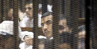 المتهمون فى اقتحام سجن بورسعيد خلال محاكمتهم أمس