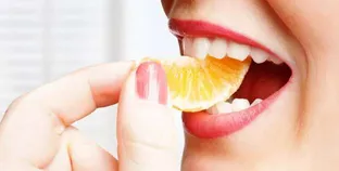 أضرار البرتقال على الأسنان