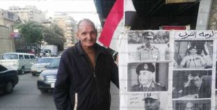 "الحاج حنفي" يشارك في الاستفتاء بدراجة وعلم مصر ولوحة شرف