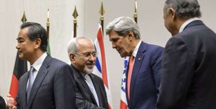 وزير الخارجية الإيرانى خلال لقاء وزير الخارجية الأمريكى السابق