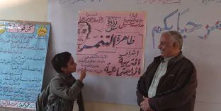 مصطفى مع أحد طلابه