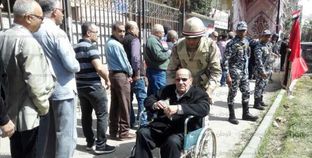 بالصور| جنود الجيش والشرطة بانتخابات الرئاسة: إيد بتساعد.. وسلاح بيحمي