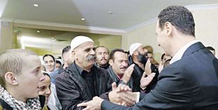 «الأسد» خلال استقبال مجموعة من الدروز فى دمشق «أ. ف. ب»