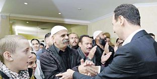 «الأسد» خلال استقبال مجموعة من الدروز فى دمشق «أ. ف. ب»