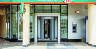 البنك الأهلى ينجح فى التوافق مع متطلبات «فيزا وماستر كارد»