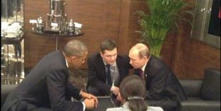 صورة تجمع الرئيس الروسي ونظيره الأمريكي في جلسة غير رسمية بعد انعقاد قمة العشرين