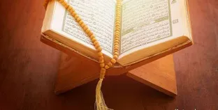 حكم قراءة القرآن للجنب - تعبيرية