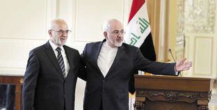 وزير الخارجية العراقى خلال لقائه مع نظيره الإيرانى أمس «أ.ف.ب»