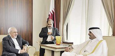 أمير قطر ووزير خارجية إيران فى لقاء سابق «صورة أرشيفية»
