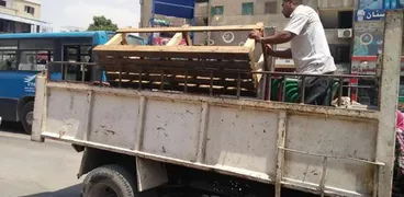 جانب من حملة إزالة اشغالات موقف العاشر