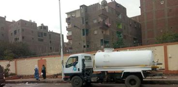 تمركز معدات شفط مياه الأمطار ومراجعة شاملة للبالوعات بشوارع الجيزة