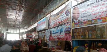 إزدحام المواطنين على شراء السلع الغذائية بأسعار المخفضة بأسواق تحيا مصر وأقوال أمنية ومكبرات صوت تشغل"تسلم الأيادي "