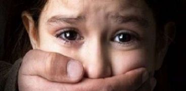 صورة  ارشيفية - طفلة تتعرض للتحرش