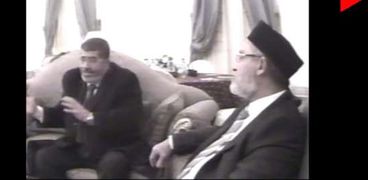 مرشد جماعة الإخوان مع الرئيس المعزول مرسي