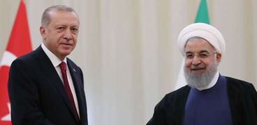 لقاء سابق بين الرئيس التركى ونظيره الإيرانى