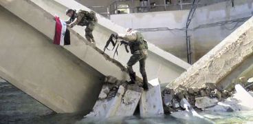 القوات السورية تسيطر على محطة المياه بـ«وادى بردى» «أ.ف.ب»