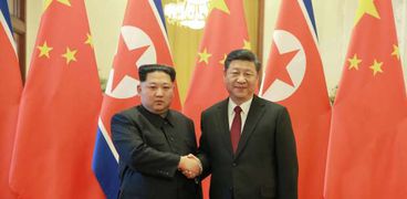 شي جينبينج والزعيم الكوري الشمالي