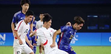 مباراة سابقة بين منتخبي اليابان وكوريا الشمالية