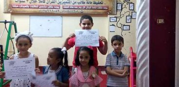 عدد من الأطفال المشاركين فى كتاتيب لحفظ القرآن