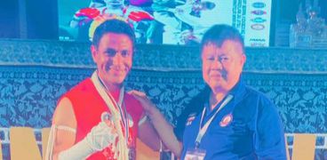 الكابتن علي البربري بطل العالم في المواي تاي بوران خلال مشاركته في بطولة العالم للماستر بتايلاند