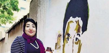 «سارة» رسمت وجه «زكى» على أحد جدران «جليم»