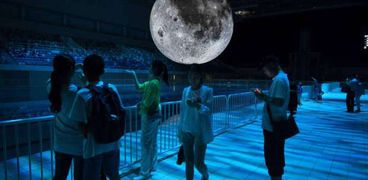 الصين تخطط لإطلاق قمر "بشري" يضيء الأرض ليلا