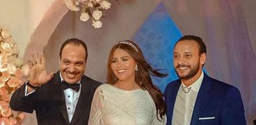 صورة معدلة تجمع أحمد خالد صالح ووالده في زفافه