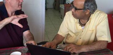الصحفى المصرى «سعيد شعيب» والباحث الكندى «توم كویجان»