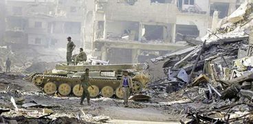وحدات الأمن السورى تسيطر على مخيم اليرموك «أ. ف. ب»