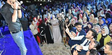 بالصور| هيثم شاكر يتألق في حفل تخرج جامعة بورسعيد
