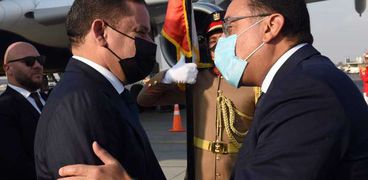 مدبولي يستقبل رئيس حكومة الوحدة الوطنية الليبية بمطار القاهرة