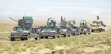 القوات العراقية تواصل عملية استعادة «الموصل» من تنظيم «داعش» الإرهابى «أ.ف.ب»