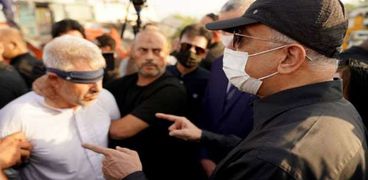 رئيس وزراء العراق فى مواجهة مع المتهم باغتيال مدير بلدية كربلاء