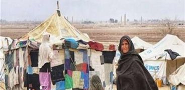 سيدة أفغانية في مخيم إيواء