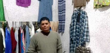 «أحمد» صاحب محل الملابس