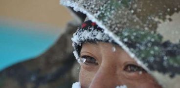 بالصور| "الثلوج" تعطل عشرات الآلاف من الصينيين عن الاحتفال برأس السنة القمرية