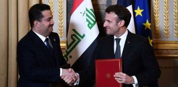 رئيس مجلس الوزراء العراقي مع الرئيس الفرنسي - ارشيفية