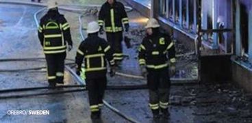 عناصر من قوات الإطفاء في السويد