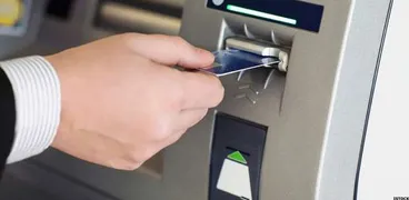رسوم السحب النقدي والاستعلام من ماكينات ATM